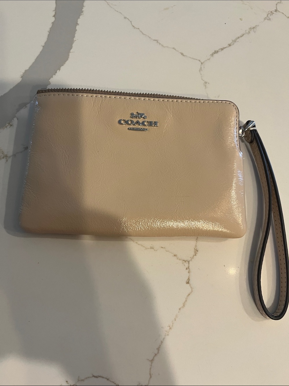 Coach Glossy Pebbled Leather Wristlet in Beige